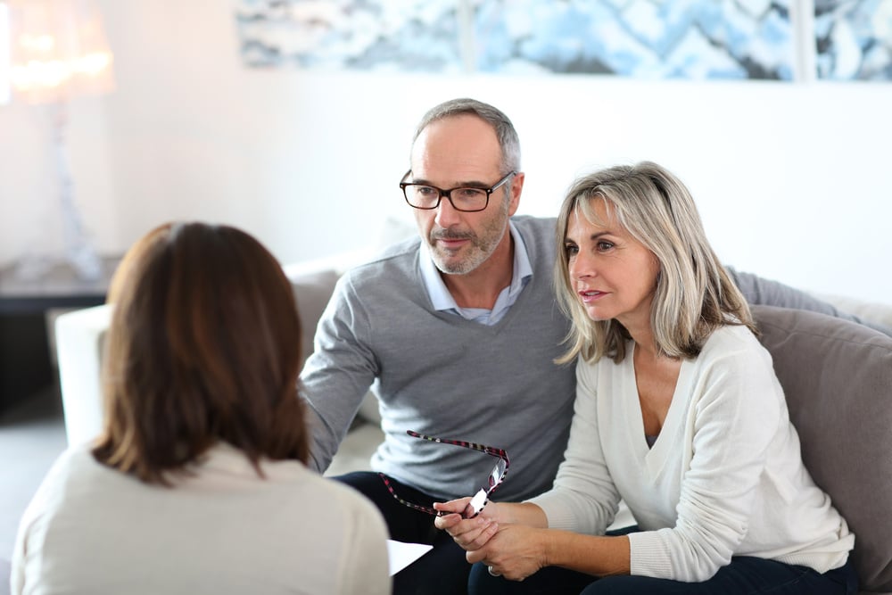 Senior Couple Meeting Financial Advisor for Investment Help
