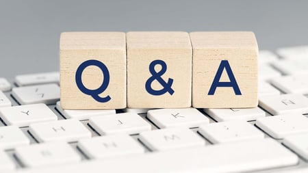 Q&A blocks on a keyboard