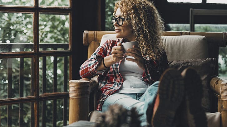 Middle Aged Woman Relaxing With Coffee